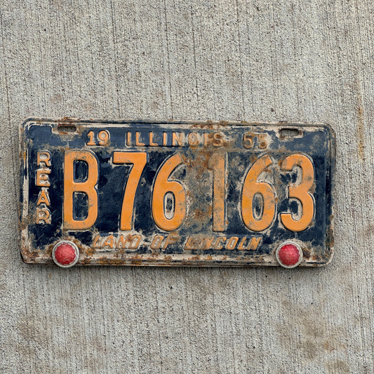 Photo of a 1955 Illinois Truck License Plate Auto Tag Garage Decor Vintage Rear Plate with Plastic Reflector Jewels B 76 163 with original patina