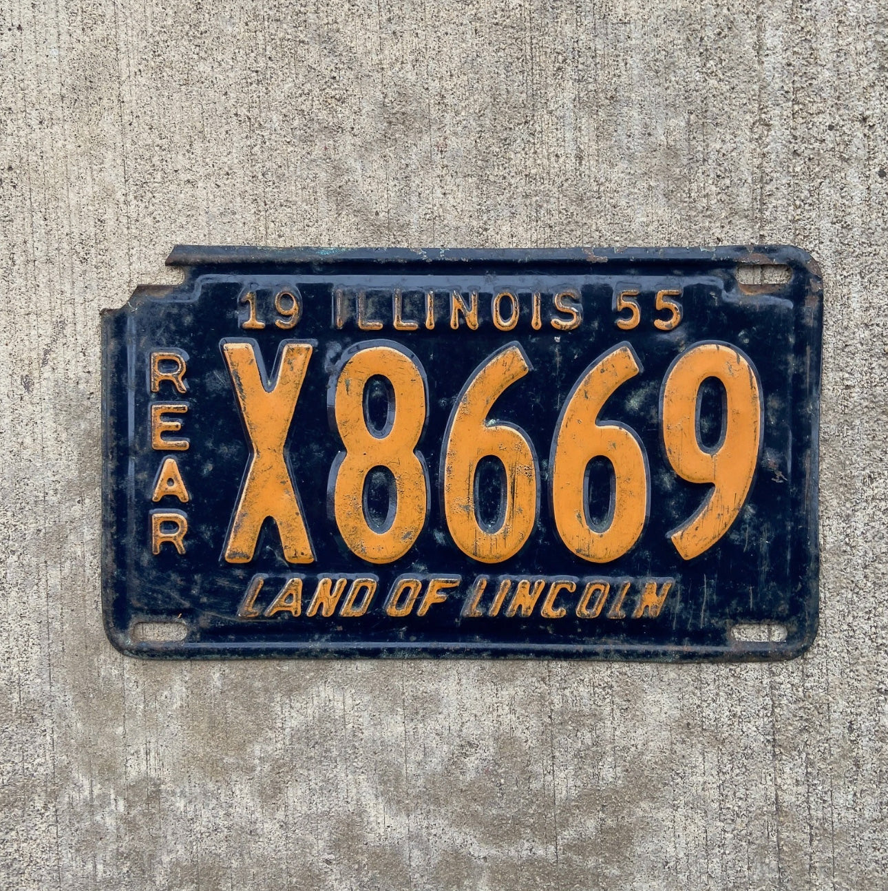 Photo of a 1955 Illinois Truck License Plate Auto Tag Garage Decor Vintage Rear X 8669 with original patina