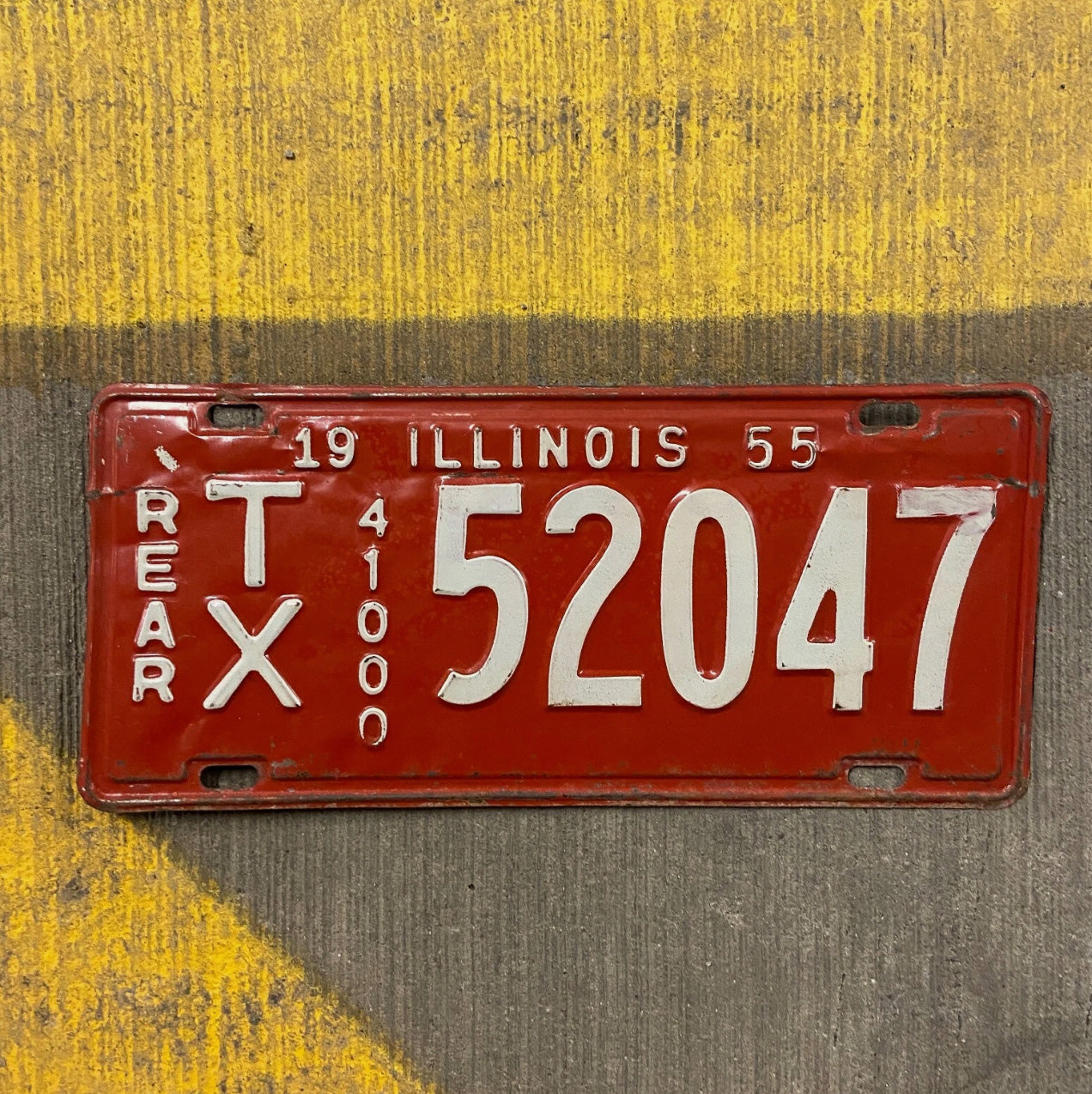 Photo of a 1955 Illinois Truck Mileage Tax License Plate Auto Tag Garage Decor Vintage Rear TX 52047 with original patina