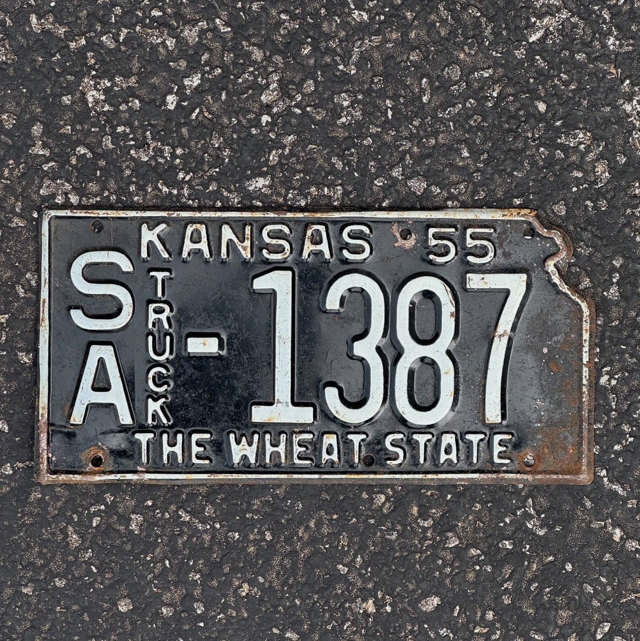 Photo of a 1955 Kansas Truck License Plate Auto Tag Garage Decor State Shape SA 1387