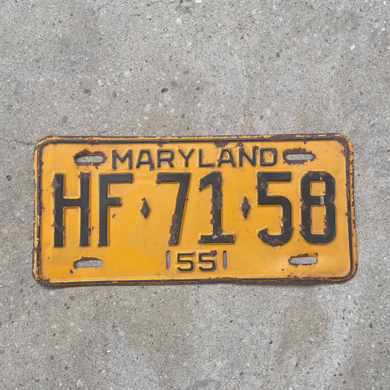 Photo of a 1955 Maryland License Plate Auto Tag Garage Decor Vintage HF 7158 with original patina