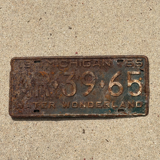 Photo of a 1955 Michigan License Plate Auto Tag Garage Decor Vintage AR 39 65 with original patina