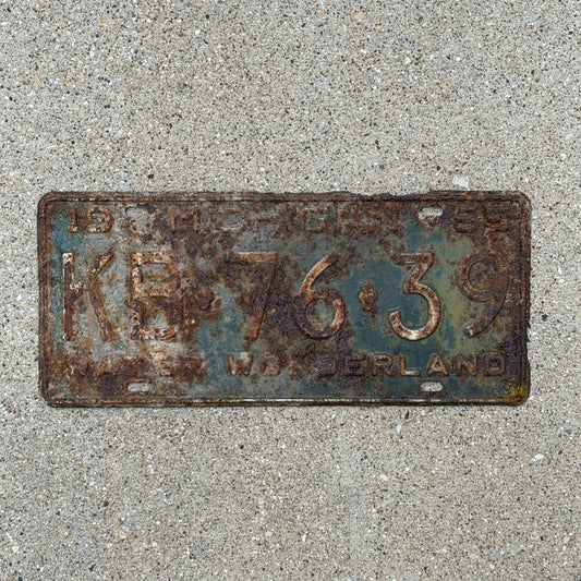 Photo of a 1955 Michigan License Plate Auto Tag Garage Decor Vintage KB 76 39 with original patina