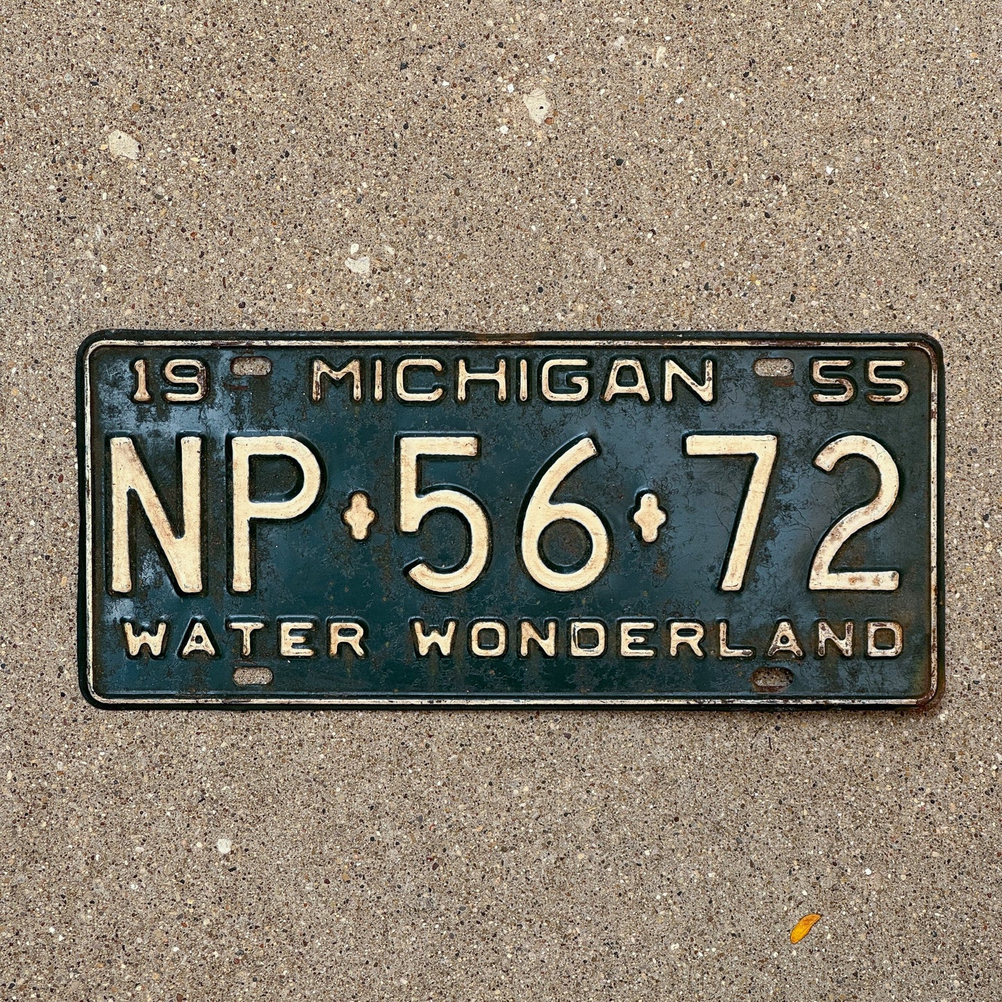 Photo of a 1955 Michigan License Plate Auto Tag Garage Decor Vintage NP 56 72 with original patina