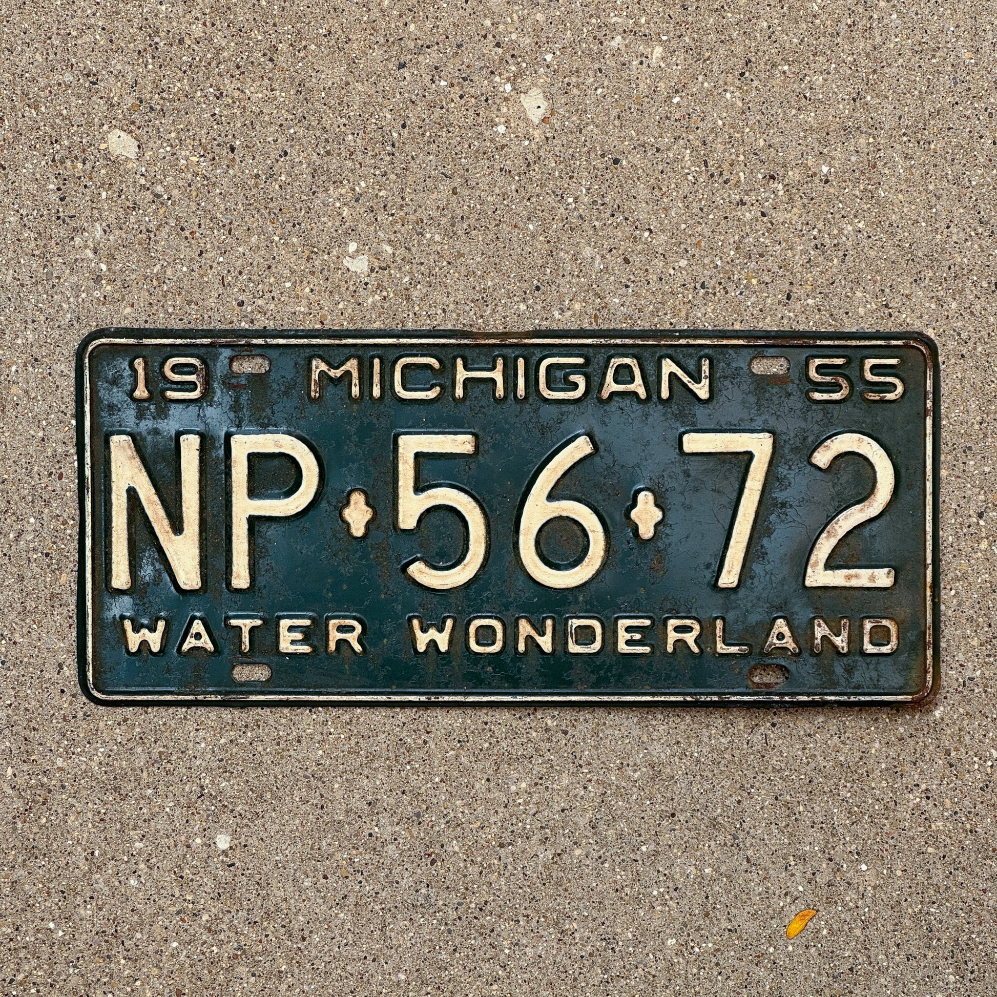 Photo of a 1955 Michigan License Plate Auto Tag Garage Decor Vintage NP 56 72 with original patina