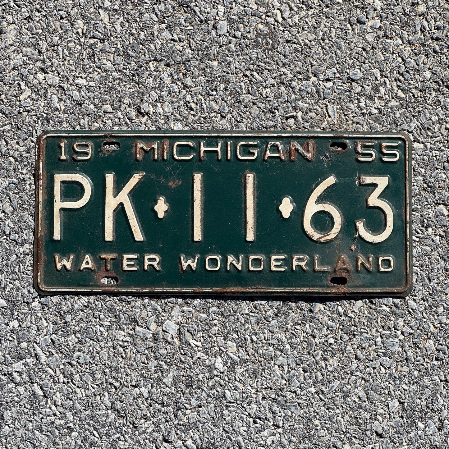 Photo of a 1955 Michigan License Plate Auto Tag Garage Decor Vintage PK 11 63