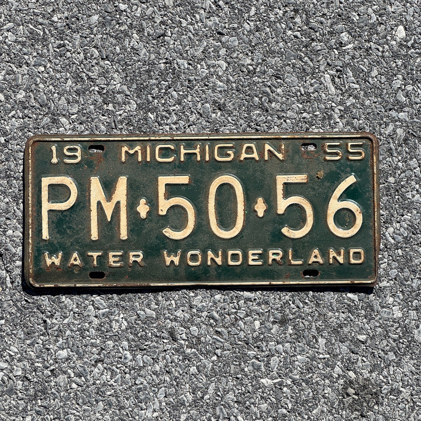 Photo of a 1955 Michigan License Plate Auto Tag Garage Decor Vintage PM 50 56