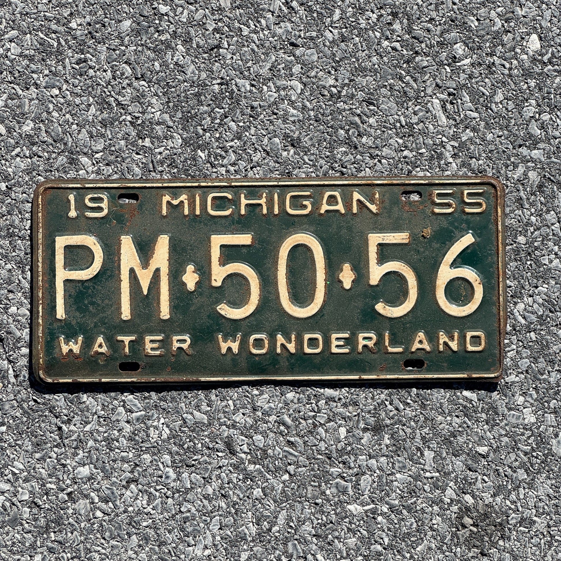 Photo of a 1955 Michigan License Plate Auto Tag Garage Decor Vintage PM 50 56