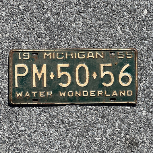 Photo of a 1955 Michigan License Plate Auto Tag Garage Decor Vintage PM 50 56