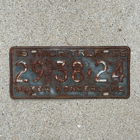 Photo of a 1955 Michigan Trailer License Plate Auto Tag Garage Decor Vintage 29 38 24 with original patina