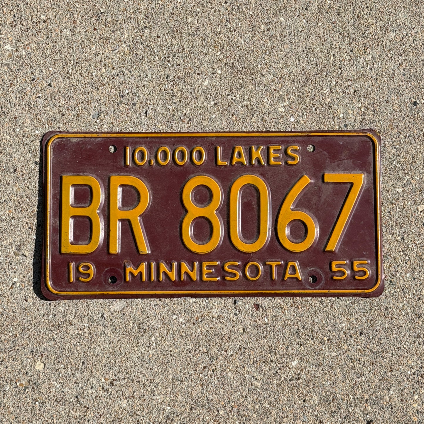 Photo of a 1955 Minnesota License Plate Auto Tag Garage Decor Vintage University Colors BR 8067 with original patina