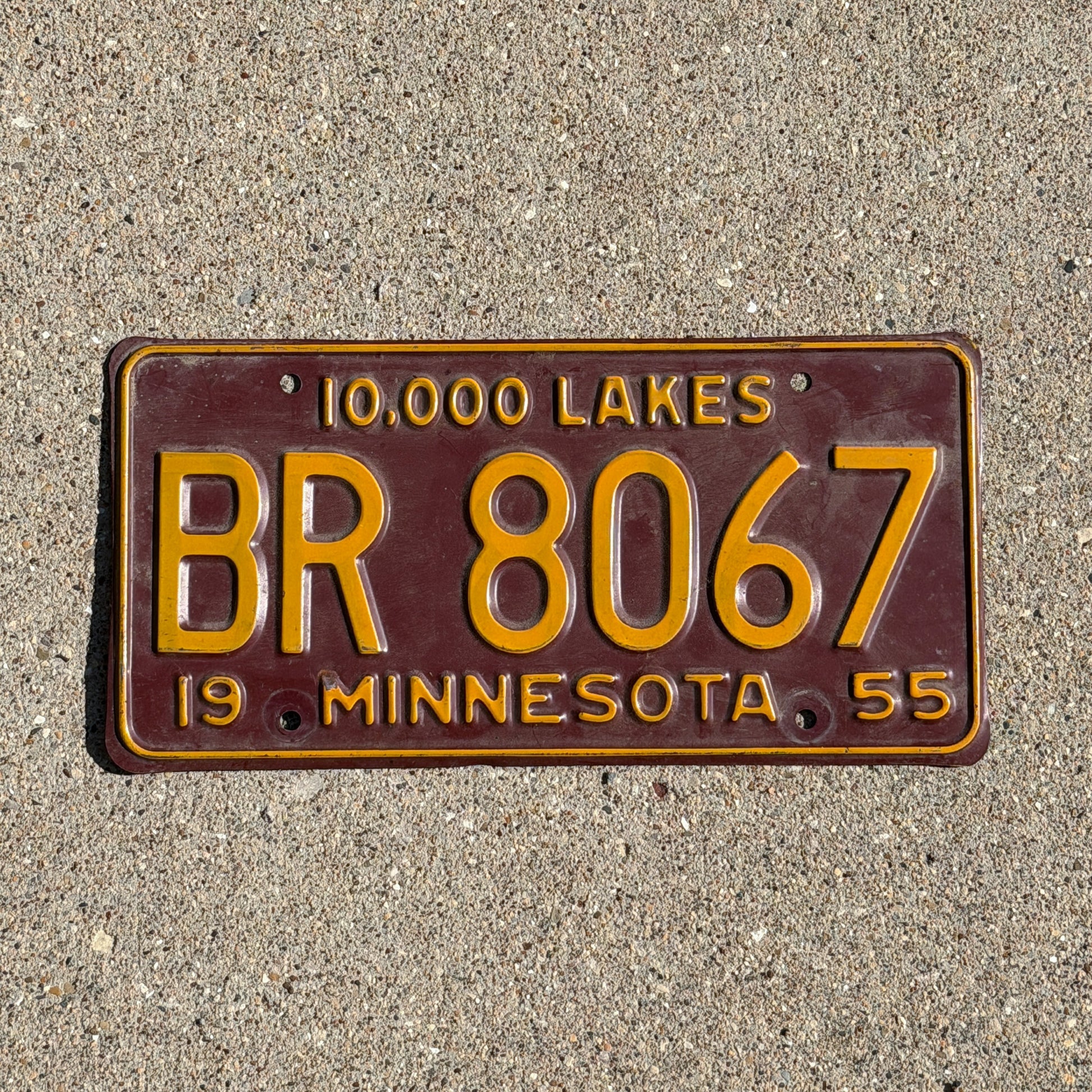 Photo of a 1955 Minnesota License Plate Auto Tag Garage Decor Vintage University Colors BR 8067 with original patina