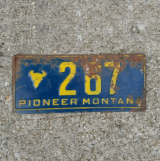 Photo of a 1955 Montana Pioneer License Plate Auto Tag Garage Decor Vintage Low Number Three Digit 267 with original patina