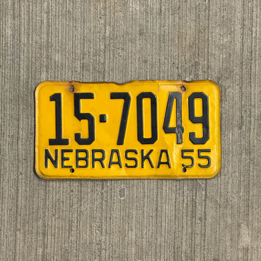 Photo of a 1955 Nebraska License Plate Auto Tag Garage Decor Vintage 15 7049 with original patina