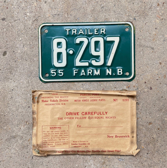 Photo of a 1955 New Brunswick Trailer License Plate Auto Tag Garage Decor Vintage with Envelope NOS 8 297 with original patina