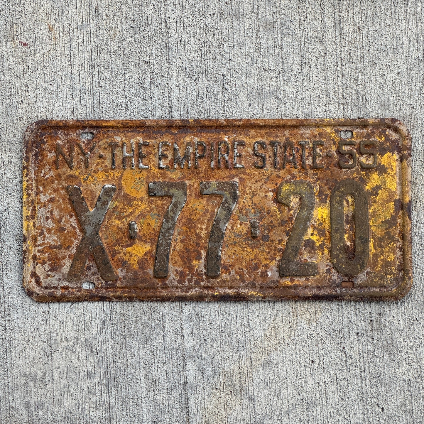 Photo of a 1955 New York License Plate Auto Tag Garage Decor Vintage X 77 20 with original patina