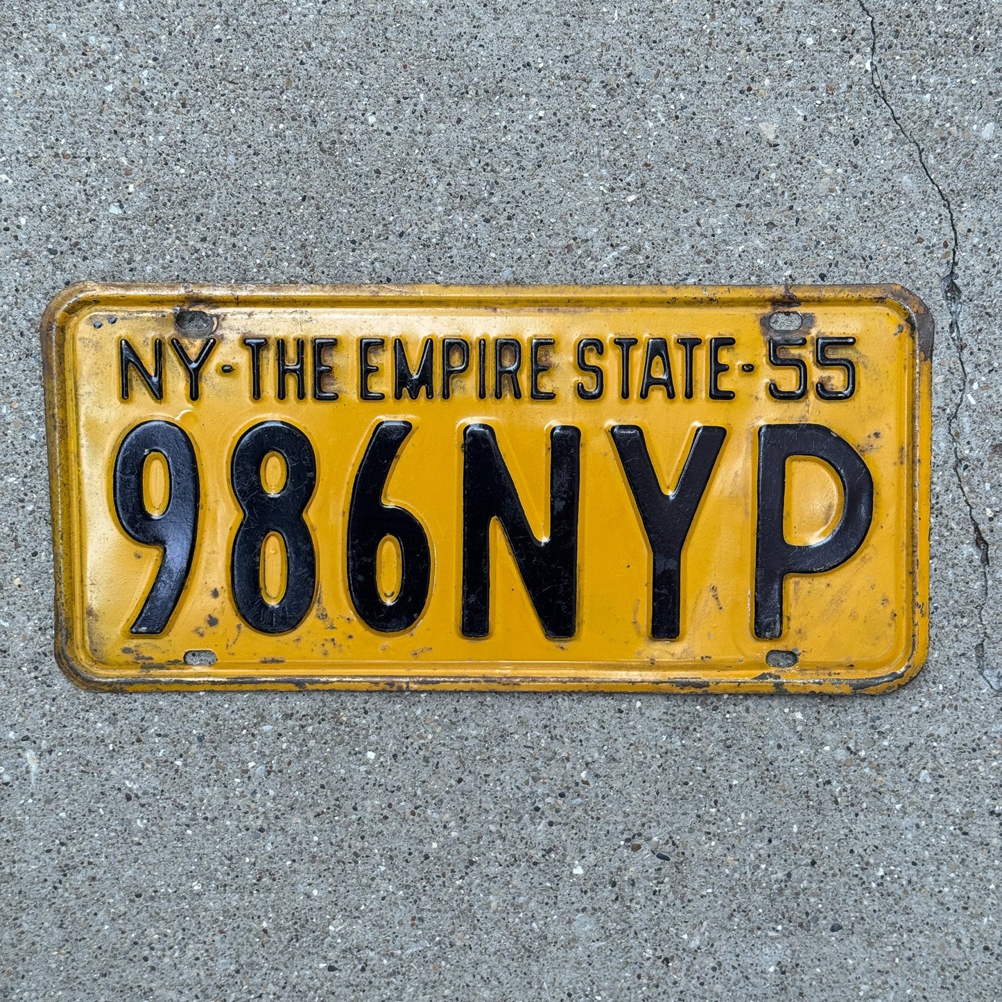 Photo of a 1955 New York Press License Plate Auto Tag Garage Decor Vintage Journalist News Paper 986 NYP with original patina