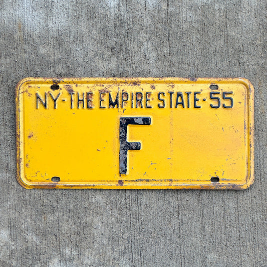 Photo of a 1955 New York Reserved License Plate Auto Tag Garage Decor Vintage Single Letter F with original patina