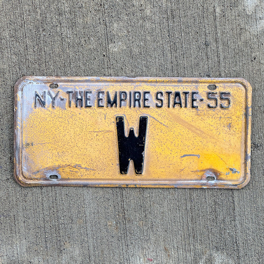 Photo of a 1955 New York Reserved License Plate Auto Tag Garage Decor Vintage Single Letter W with original patina