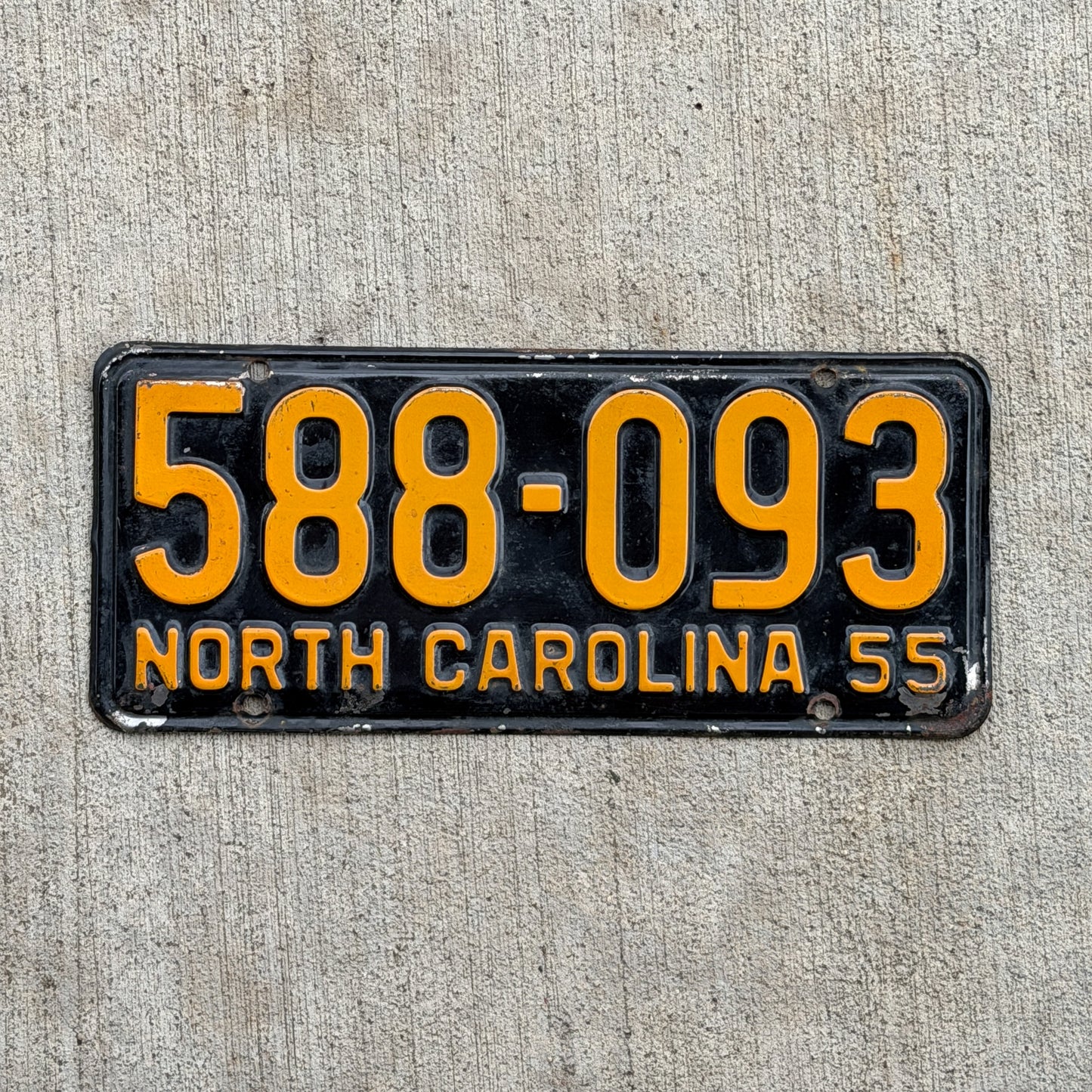 Photo of a 1955 North Carolina License Plate Auto Tag Garage Decor Vintage 588 093 with original patina