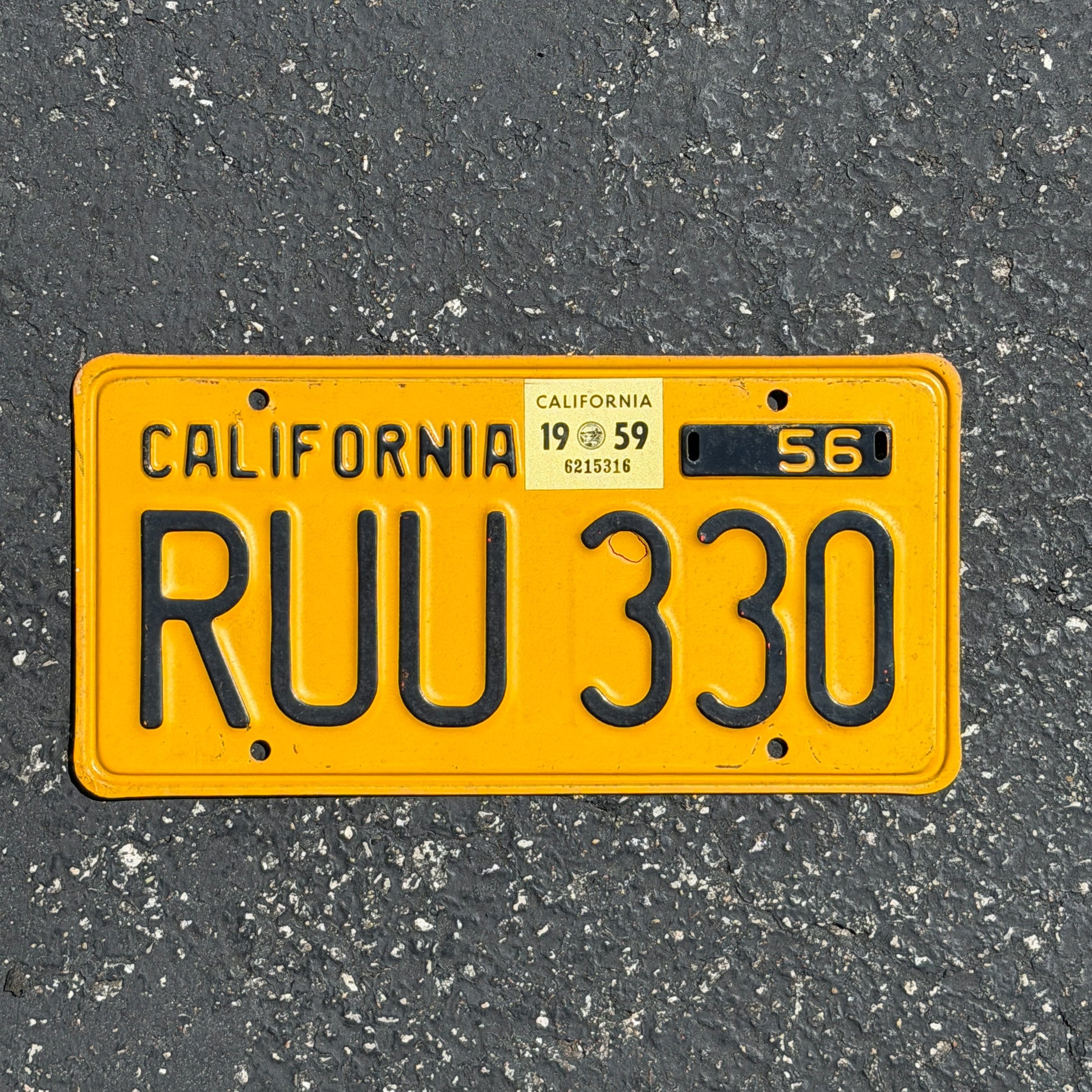 Photo of a 1956 1959 California License Plate Auto Tag Garage Decor Vintage RUU 330 with original patina