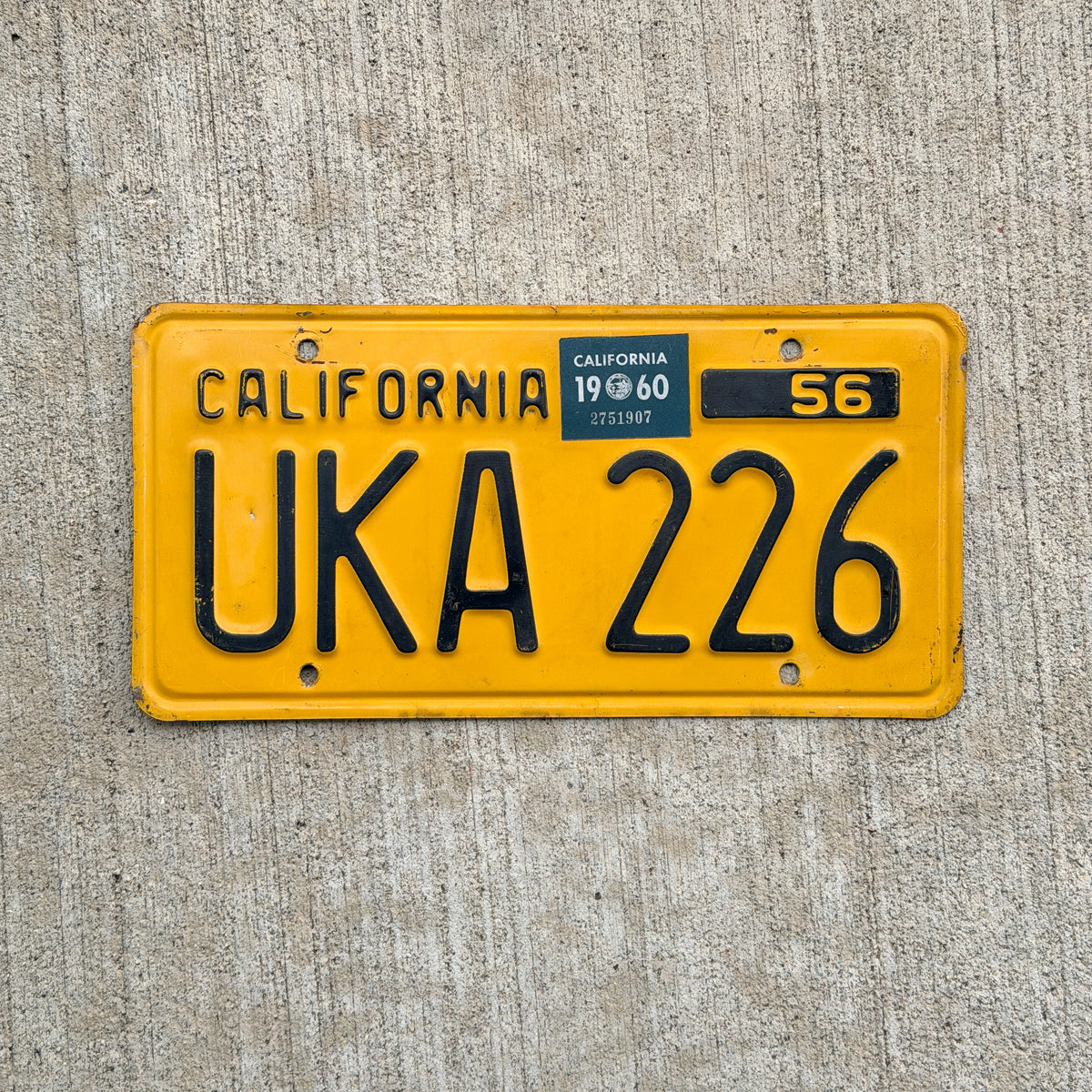 Photo of a 1956 1960 California License Plate Auto Tag Garage Decor Vintage UKA 226 with original patina