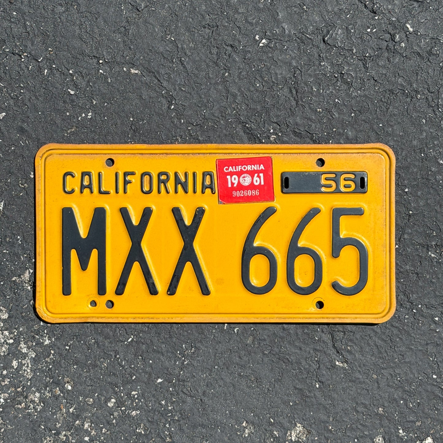Photo of a 1956 1961 California License Plate Auto Tag Garage Decor Vintage MXX 665 with original patina
