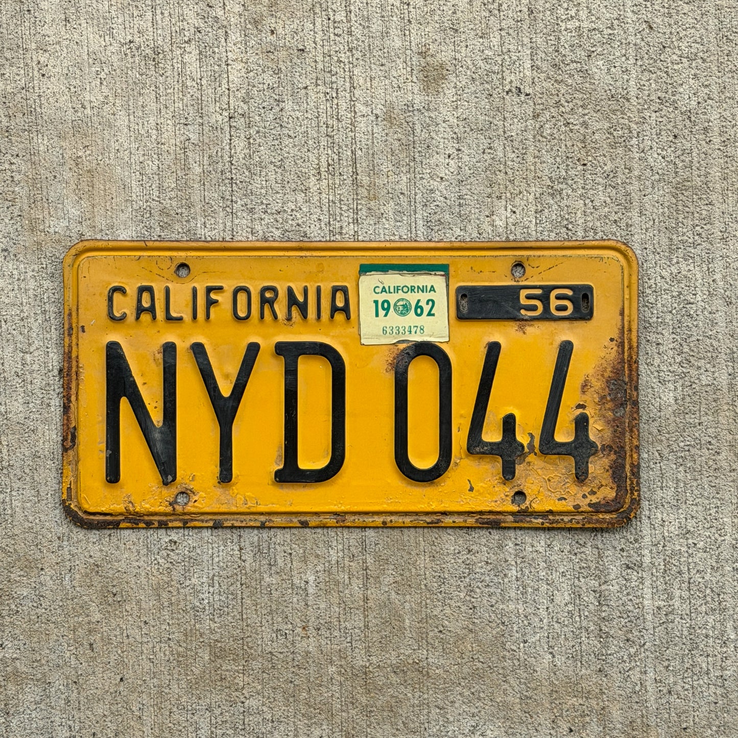 Photo of a 1956 1962 California License Plate Auto Tag Garage Decor Vintage NYD 044 with original patina