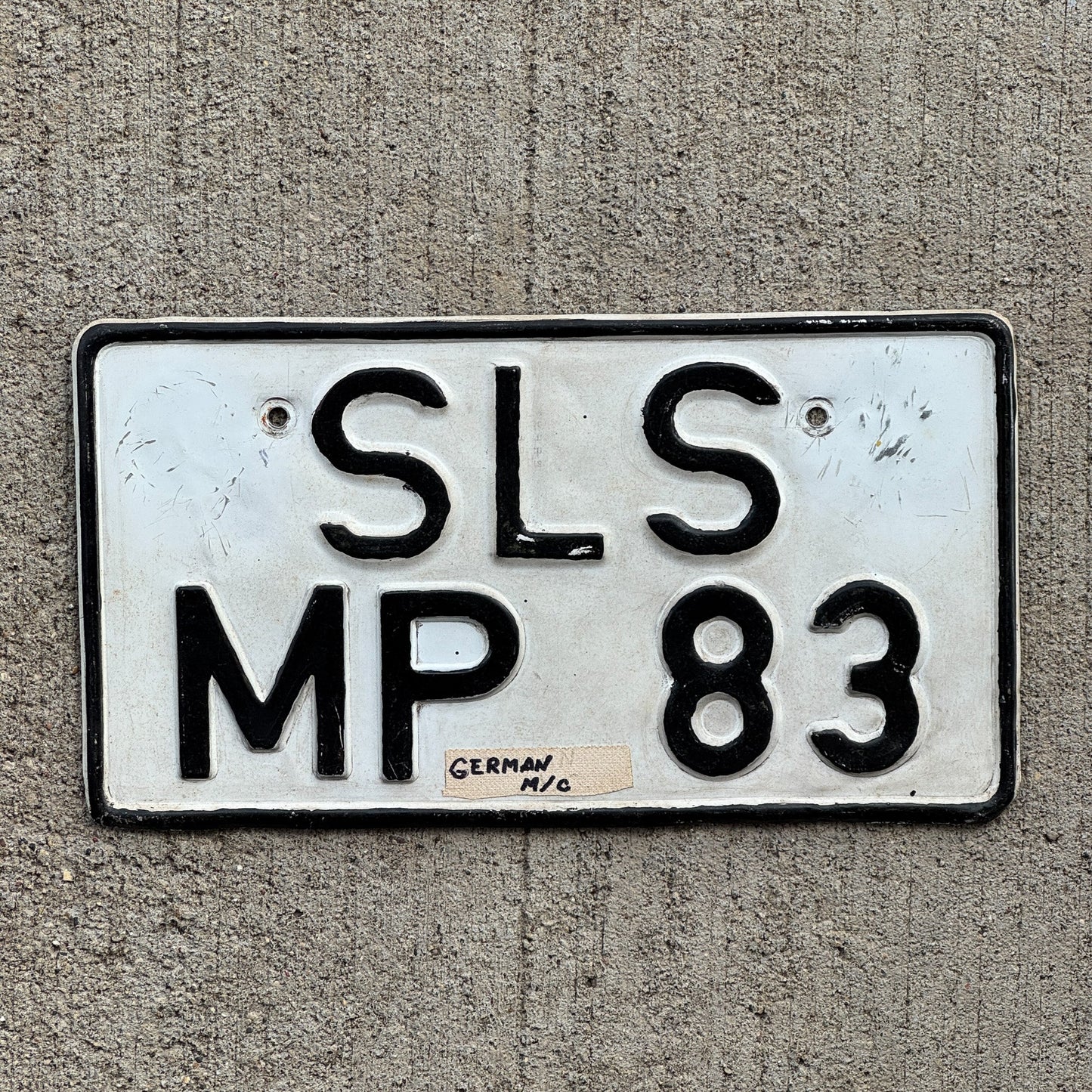 Photo of a 1956 1995 Germany Motorcycle License Plate Auto Tag Garage Decor Vintage SLS MP 83