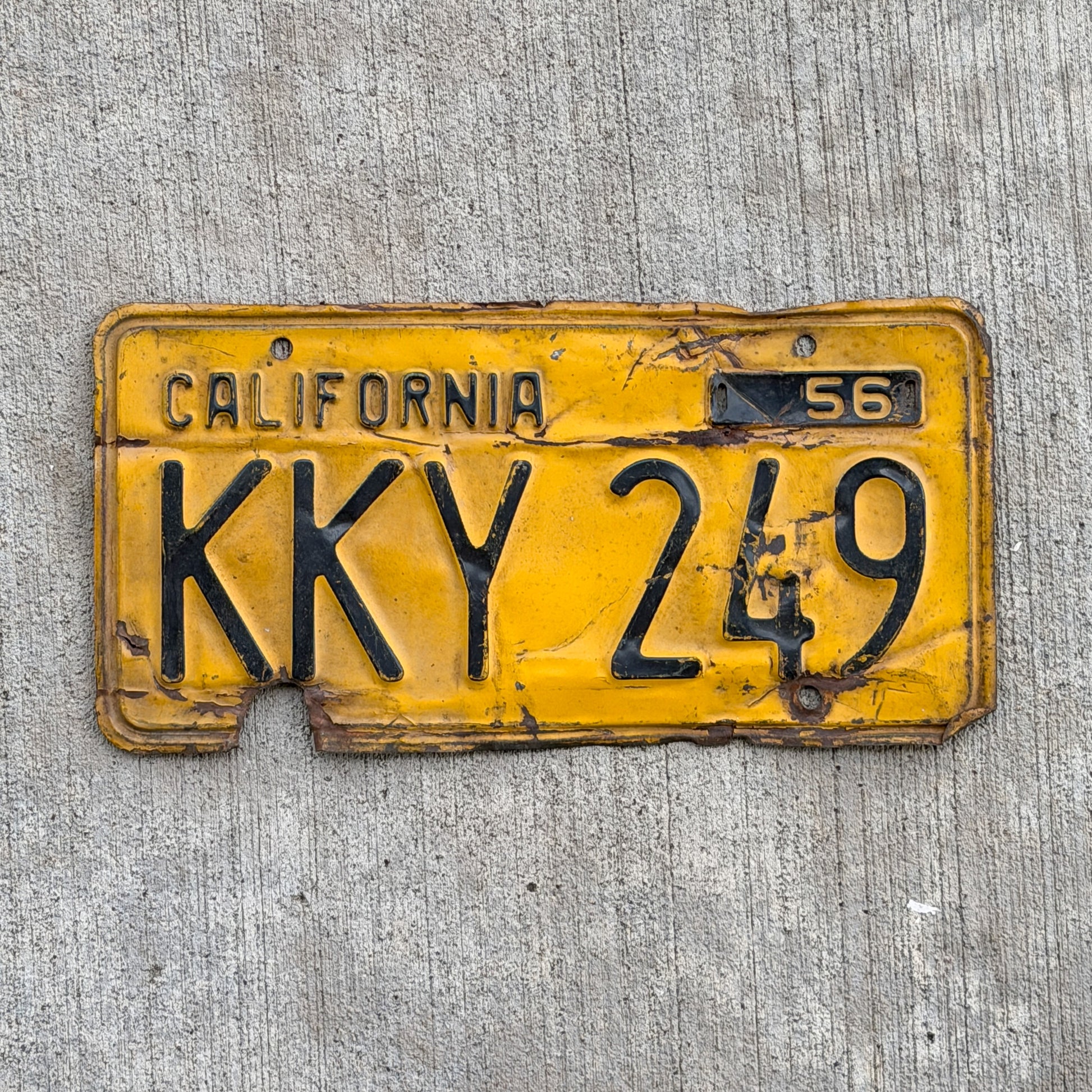 Photo of a 1956 California License Plate Auto Tag Garage Decor Vintage KKY 249 with original patina