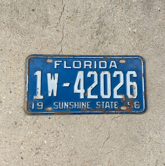 Photo of a 1956 Florida License Plate Auto Tag Garage Decor Vintage Dade County Weed Smoking 1 W 42026 with original patina