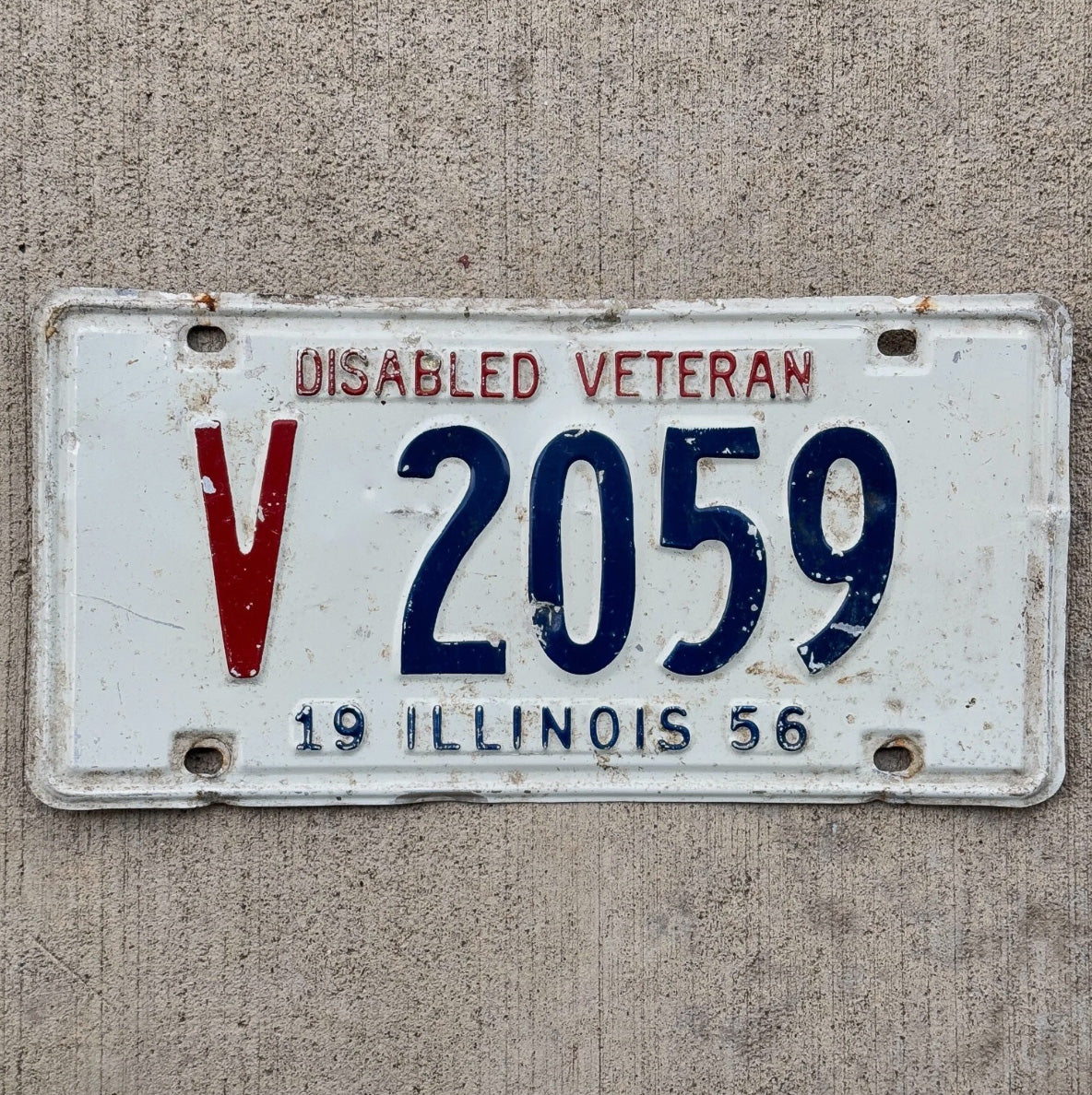 Photo of a 1956 Illinois Disabled Veteran License Plate Auto Tag 1 Garage Decor DAV V 2059