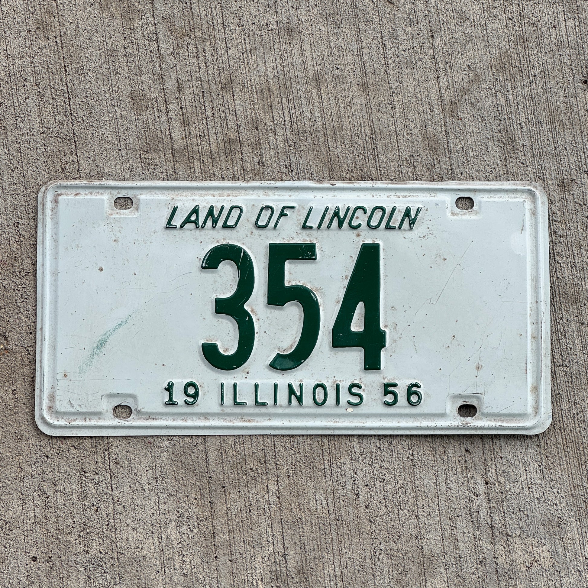 Photo of a 1956 Illinois License Plate Auto Tag Garage Decor Vintage Low Number Three Digit 354 with original patina