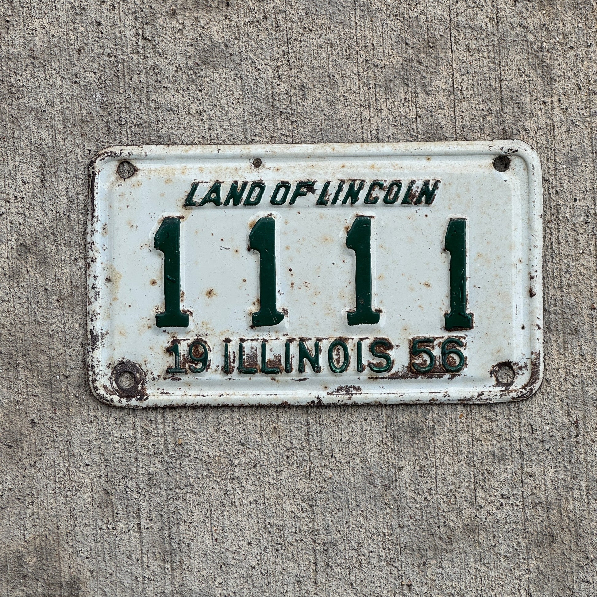 Photo of a 1956 Illinois Motorcycle License Plate Auto Tag Garage Decor Vintage Repeat Repeating 1111 with original patina