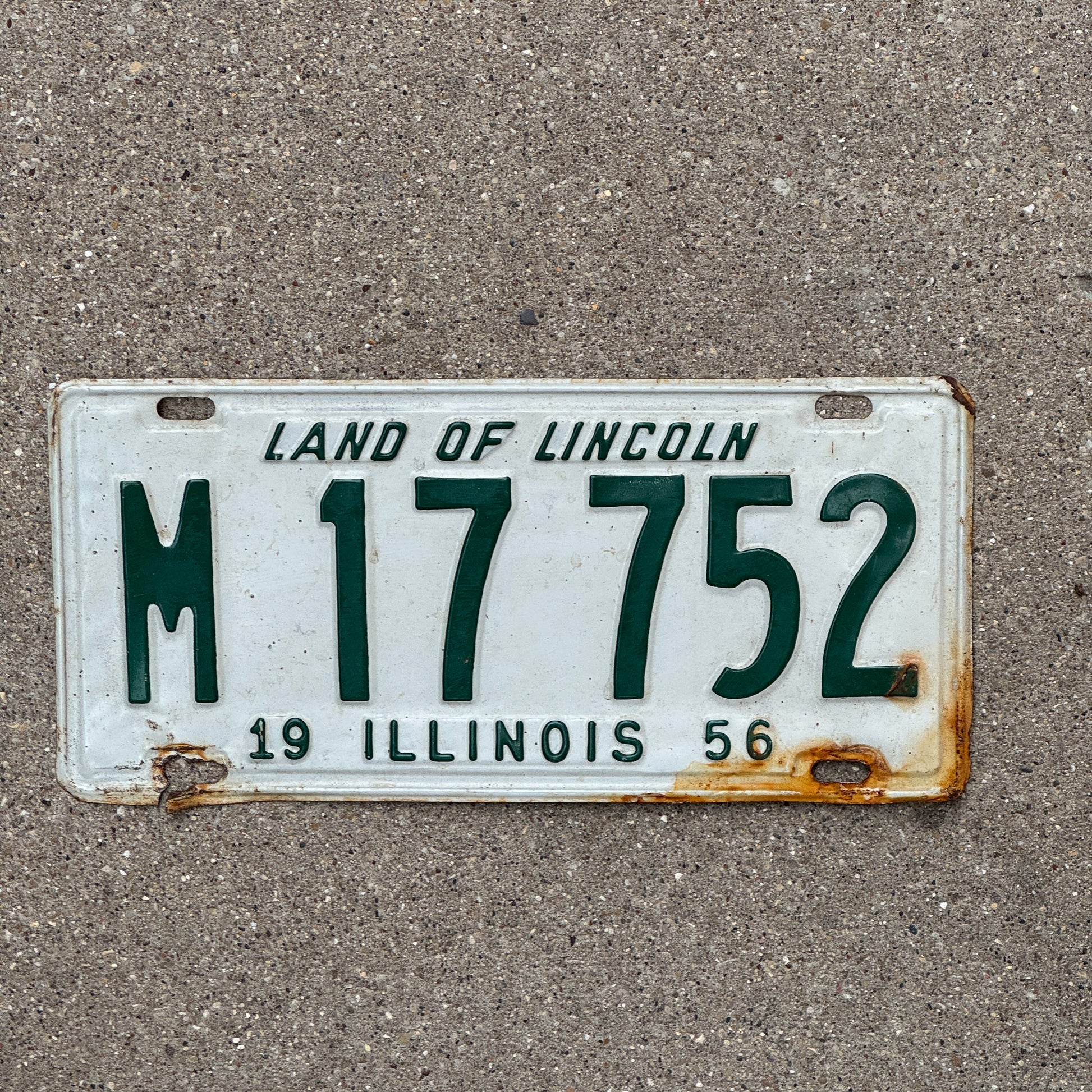 Photo of a 1956 Illinois Municipal License Plate Auto Tag 1 Vintage Garage M 17 752 with original patina