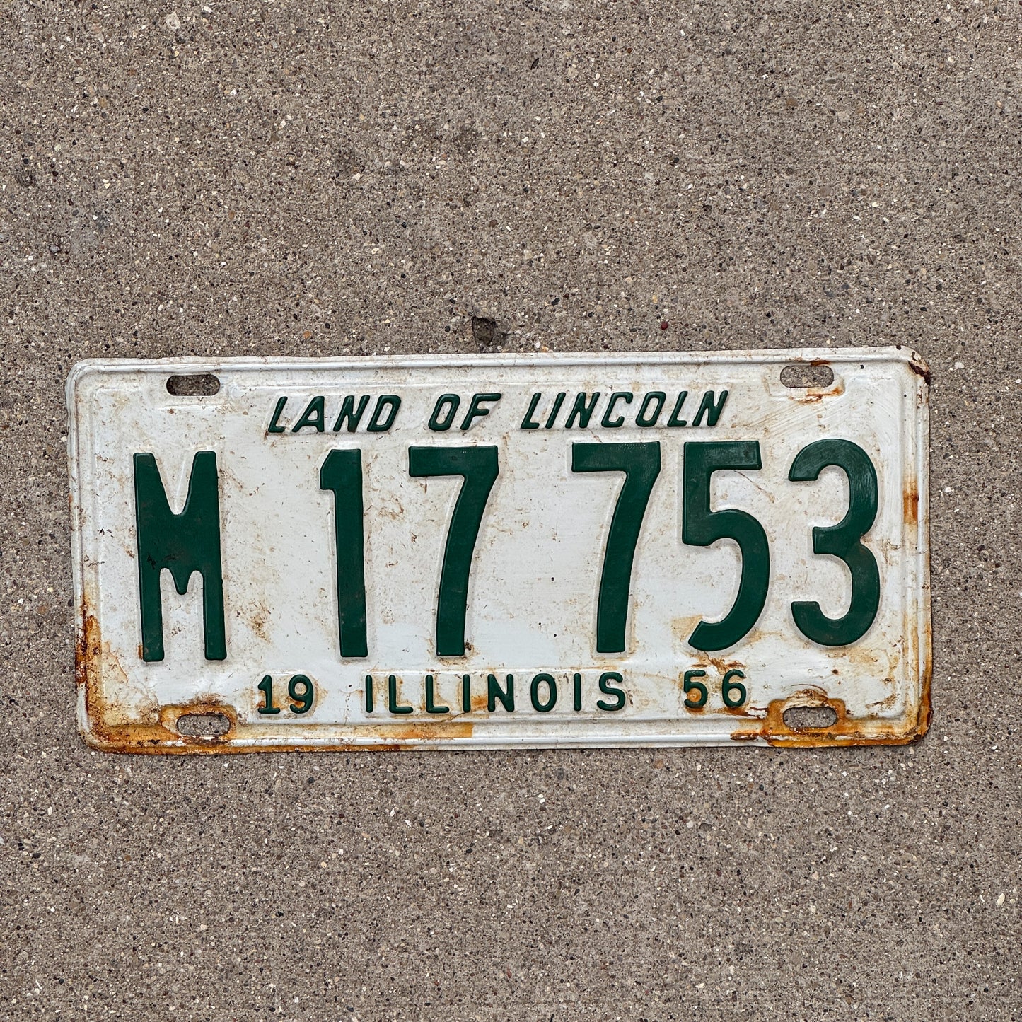 Photo of a 1956 Illinois Municipal License Plate Auto Tag 1 Vintage Garage M 17 753 with original patina