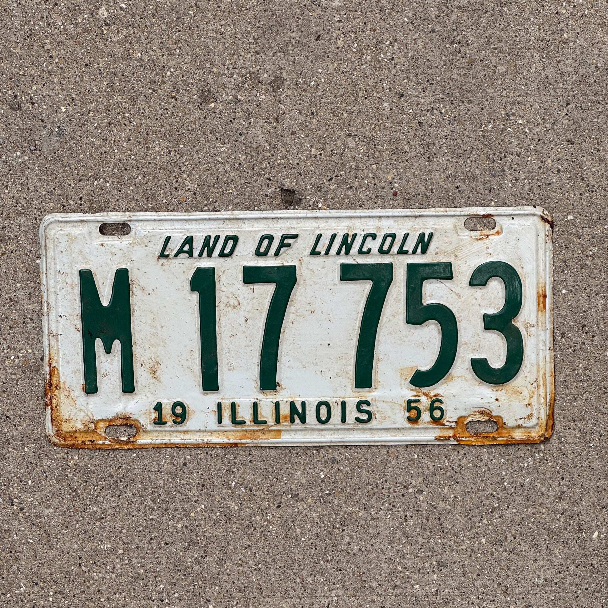 Photo of a 1956 Illinois Municipal License Plate Auto Tag 1 Vintage Garage M 17 753 with original patina