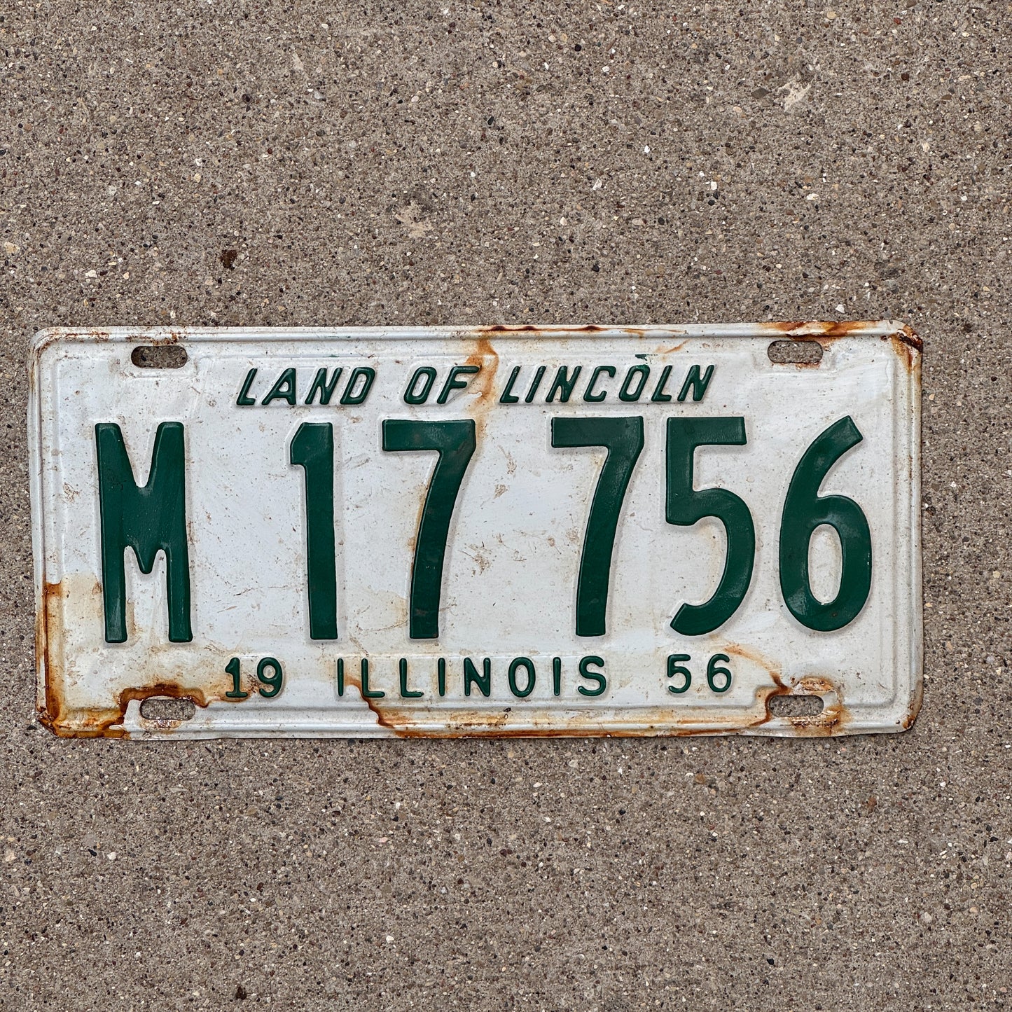Photo of a 1956 Illinois Municipal License Plate Auto Tag 1 Vintage Garage M 17 756 with original patina