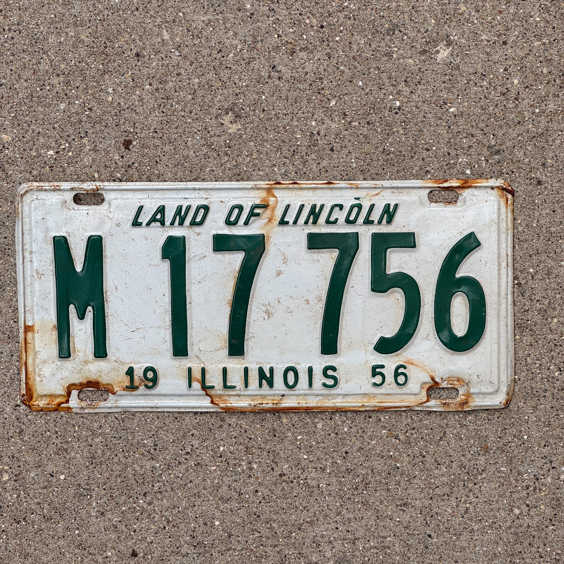 Photo of a 1956 Illinois Municipal License Plate Auto Tag 1 Vintage Garage M 17 756 with original patina