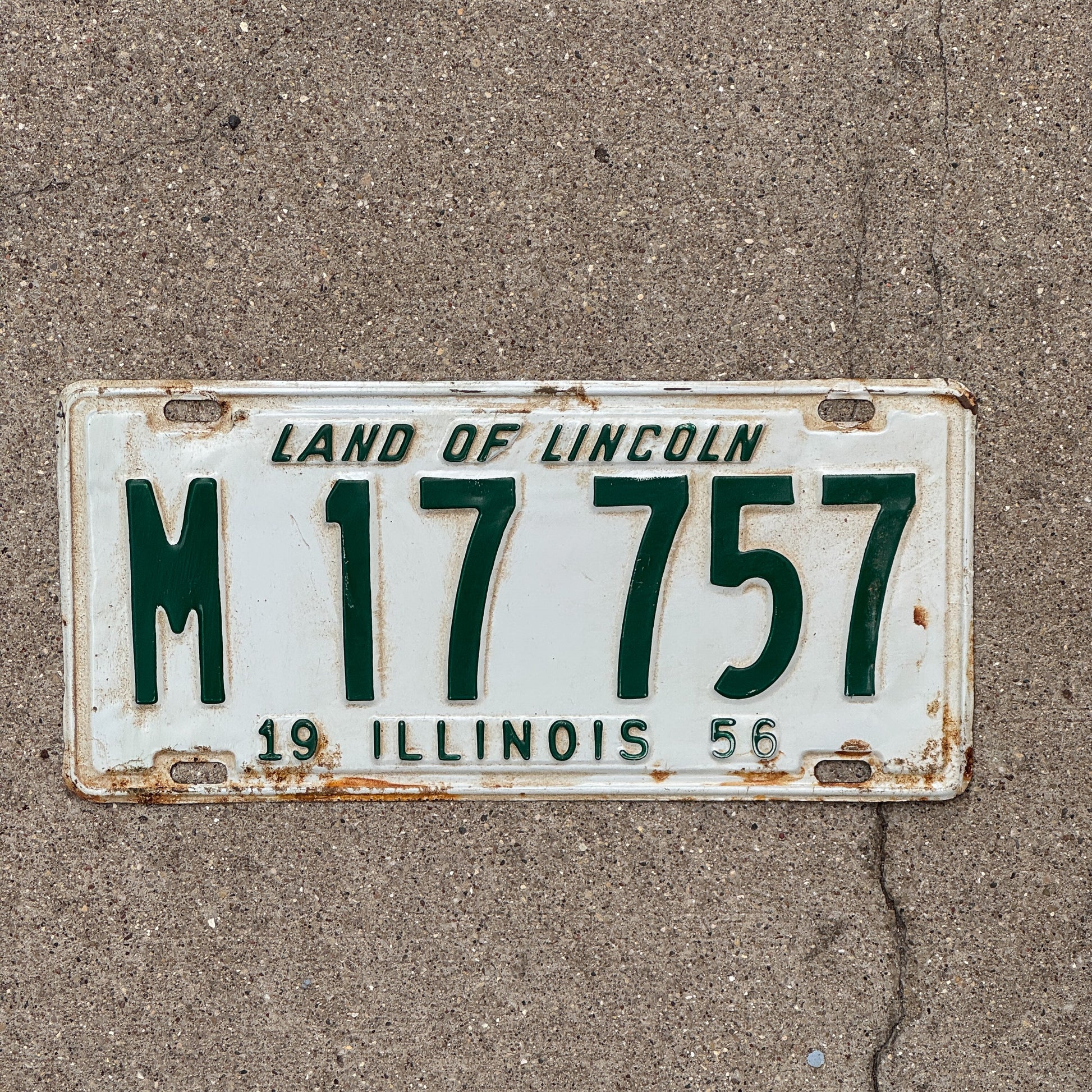 Photo of a 1956 Illinois Municipal License Plate Auto Tag 1 Vintage Garage M 17 757 with original patina