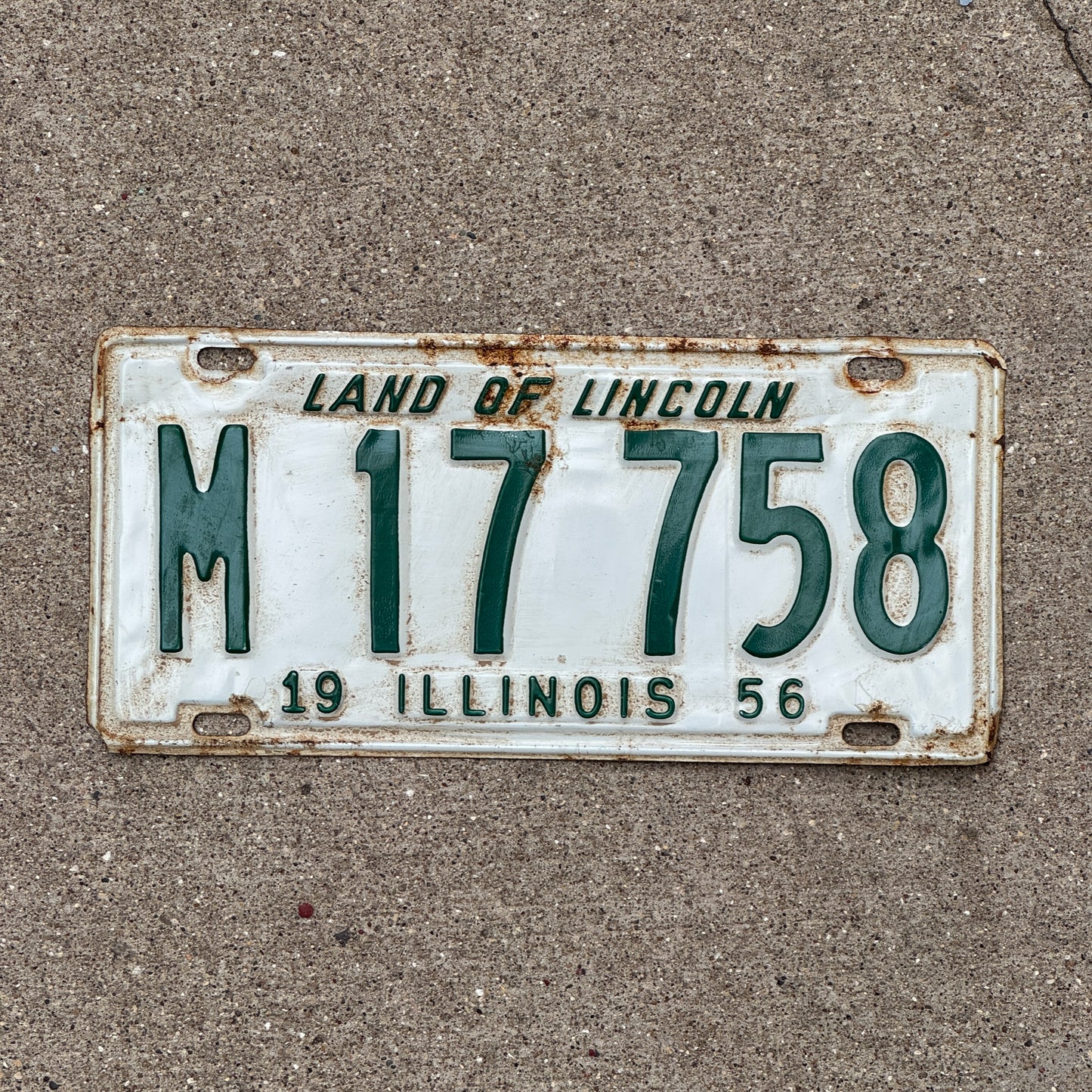 Photo of a 1956 Illinois Municipal License Plate Auto Tag 1 Vintage Garage M 17 758 with original patina