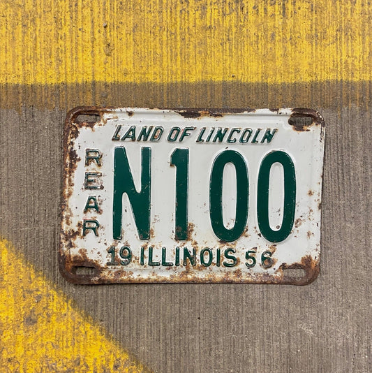 Photo of a 1956 Illinois Truck License Plate Auto Tag Garage Decor Vintage Low Number Three Digit N 100 with original patina