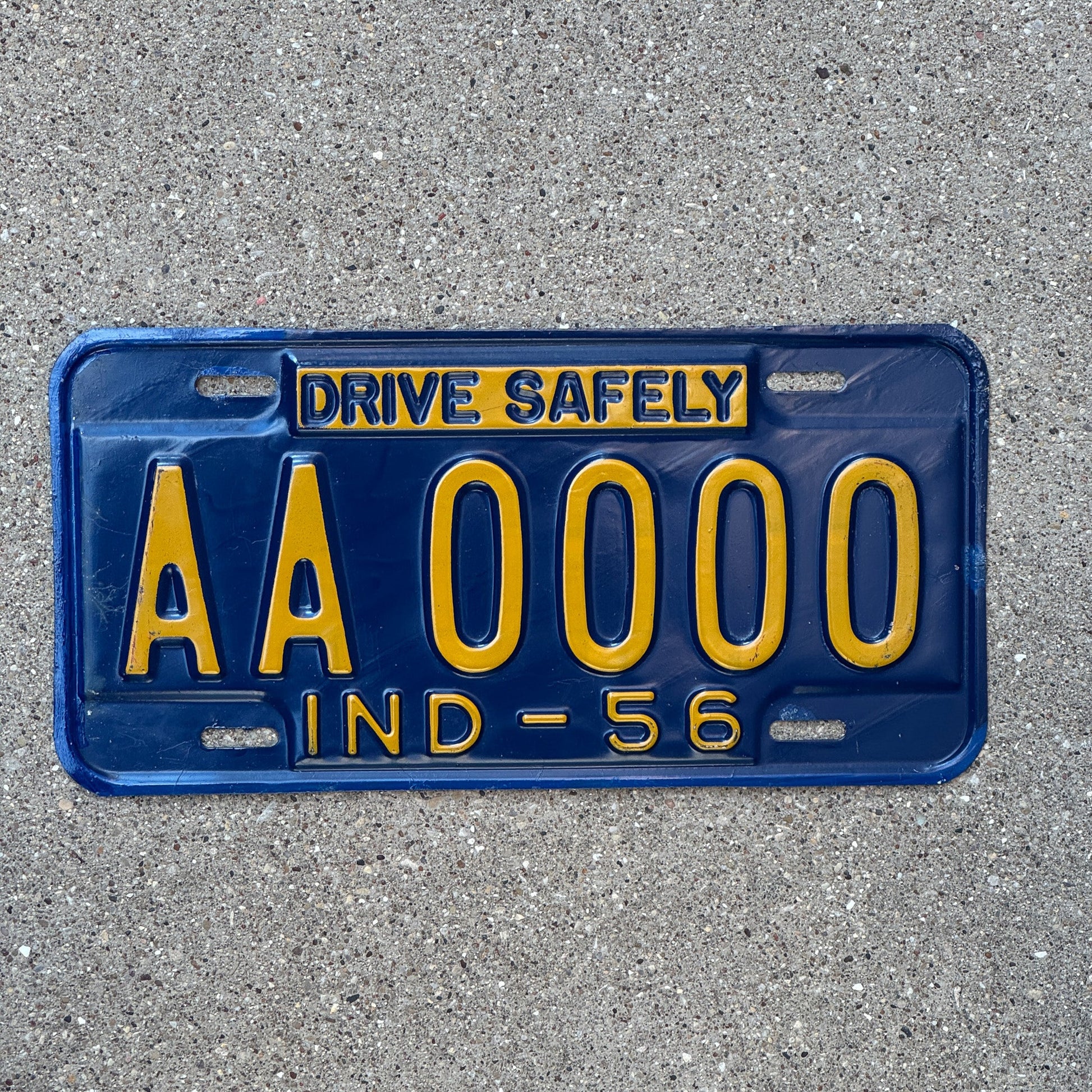 Photo of a 1956 Indiana Sample License Plate Auto Tag Garage Decor Vintage AA0000 with original patina
