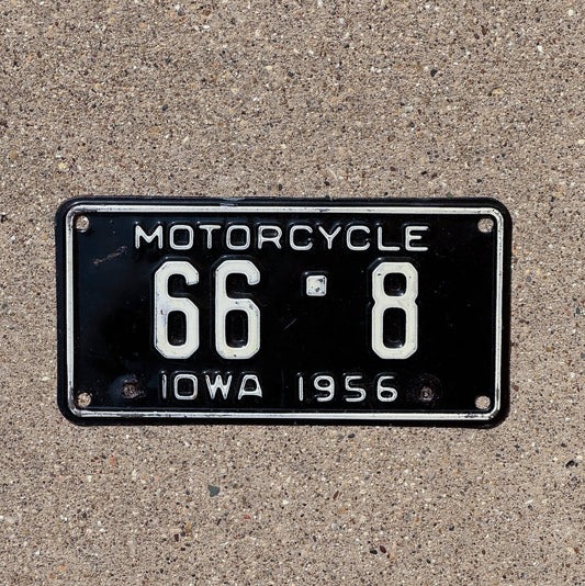 Photo of a 1956 Iowa Motorcycle License Plate Auto Tag Garage Decor Vintage Low Number Two Digit Mitchell County 66 8 with original patina