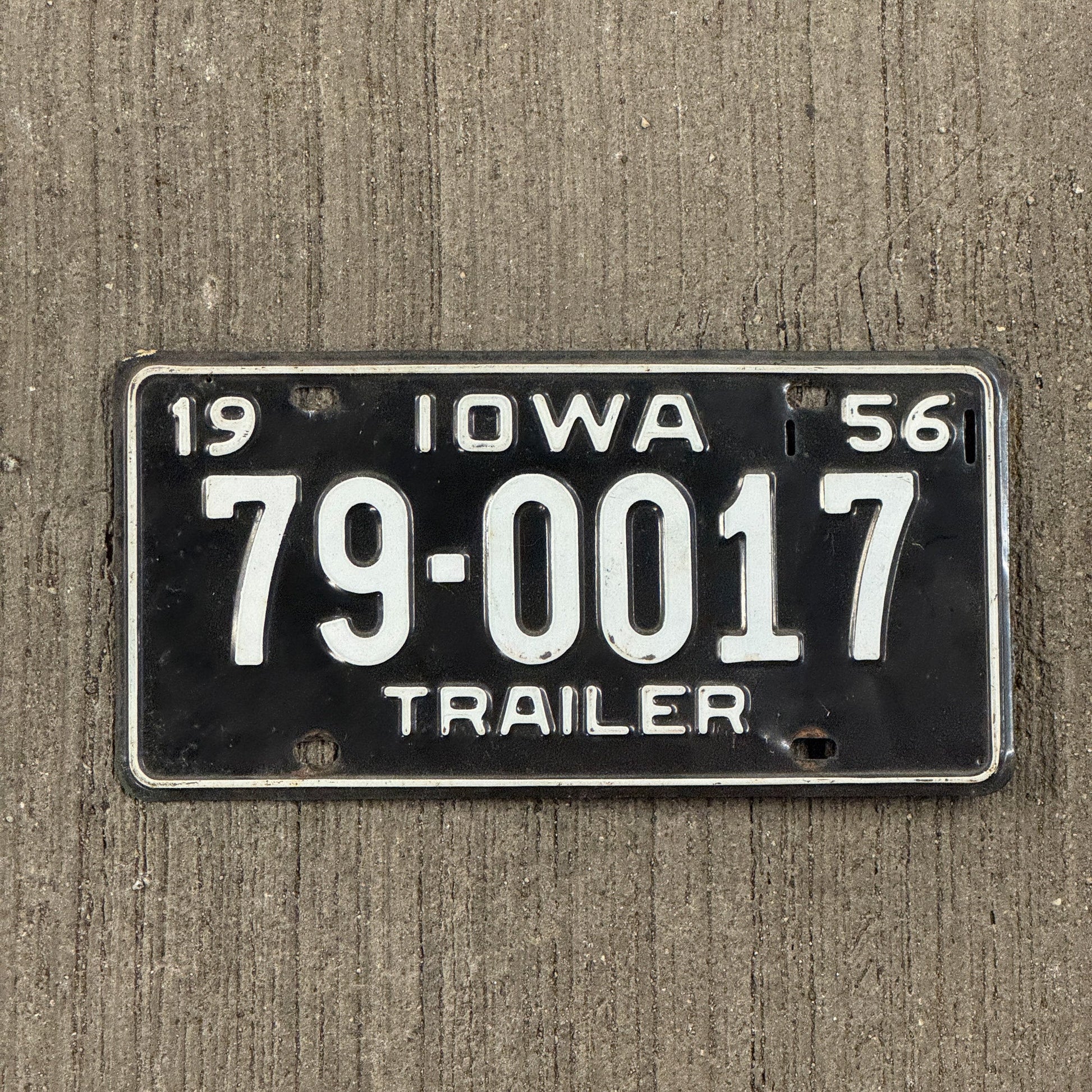 Photo of a 1956 Iowa Trailer License Plate Auto Tag Garage Decor Vintage 79 0017