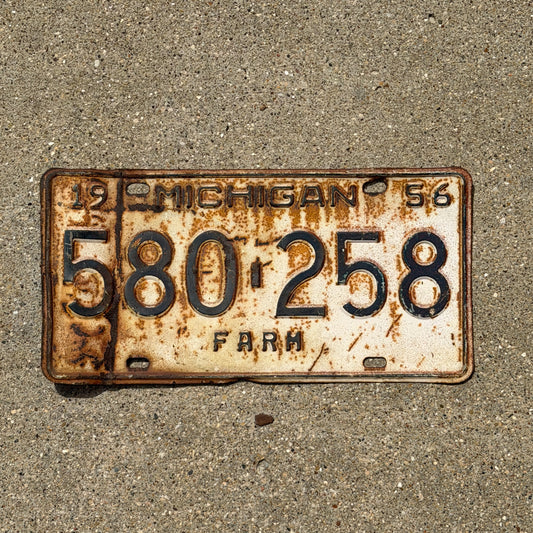 Photo of a 1956 Michigan Farm License Plate Auto Tag Garage Decor Vintage 580 258 with original patina