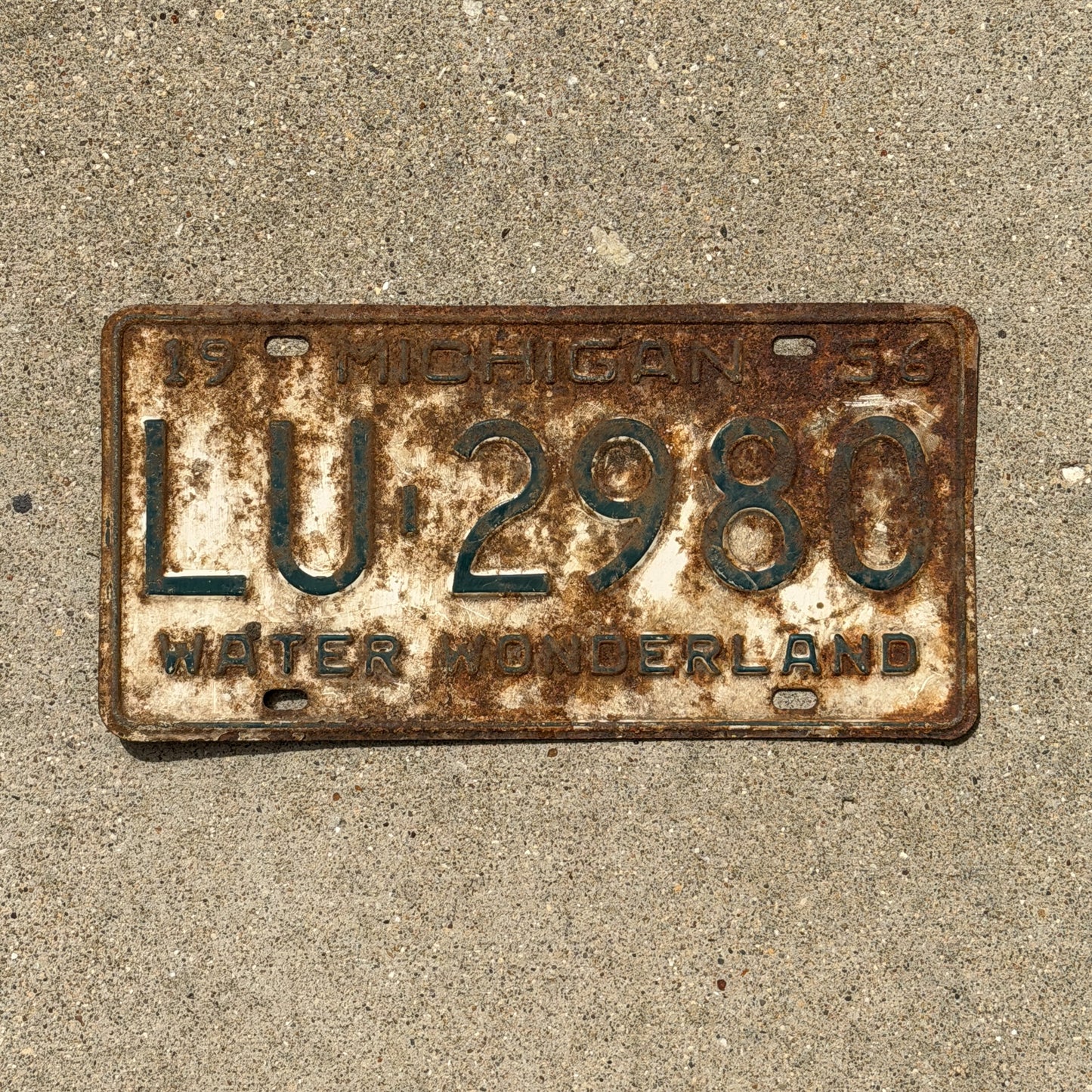 Photo of a 1956 Michigan License Plate Auto Tag Garage Decor Vintage LU 2980 with original patina