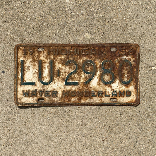 Photo of a 1956 Michigan License Plate Auto Tag Garage Decor Vintage LU 2980 with original patina