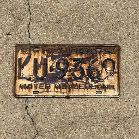 Photo of a 1956 Michigan License Plate Auto Tag Garage Decor Vintage LU 9369 with original patina