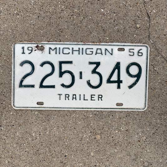 Photo of a 1956 Michigan Trailer License Plate Auto Tag Garage Decor Vintage 225 349